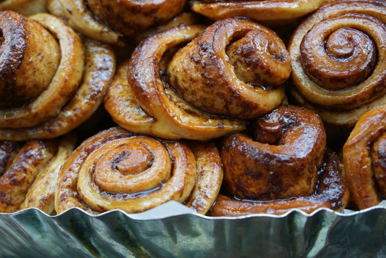 Tray of glazed cinnamon rolls
