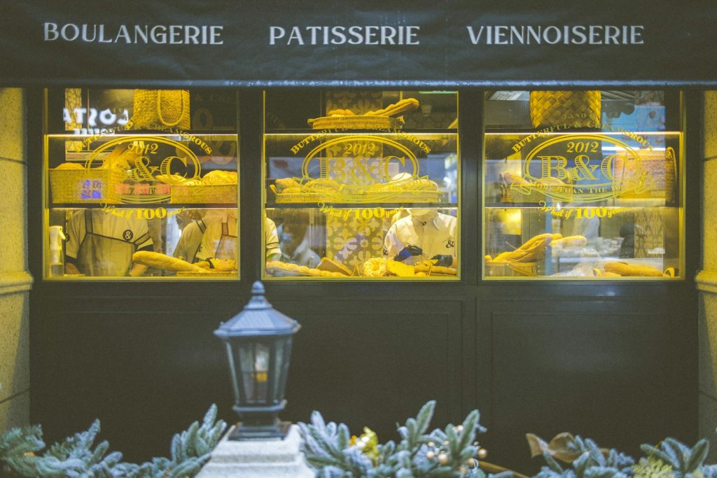 Bakery shelves lit by warm lights