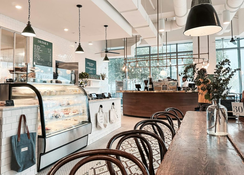 Bright café with tables and a counter