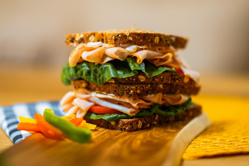Stacked sandwich with lettuce and tomato